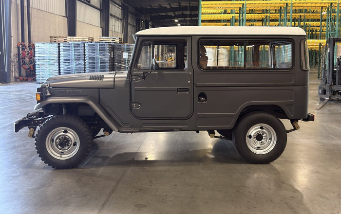 1995 Toyota Bandeirante Long Wagon in Selenite Gray Magno Matte with white matte roof — full profile