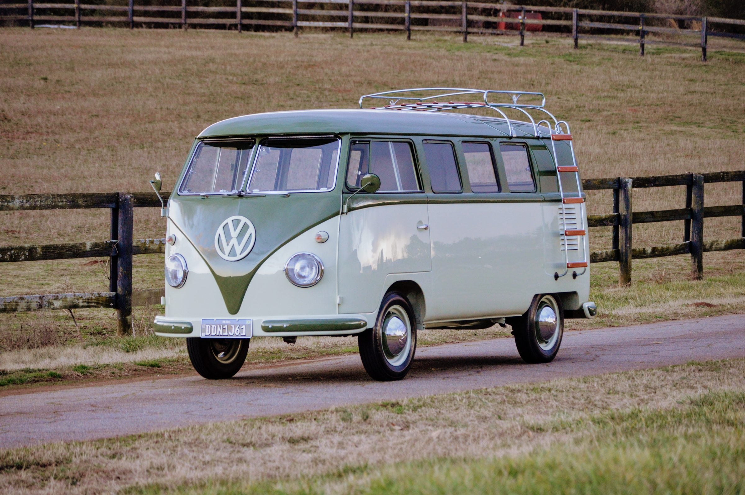 Restored green and white split-window Volkswagen Bus